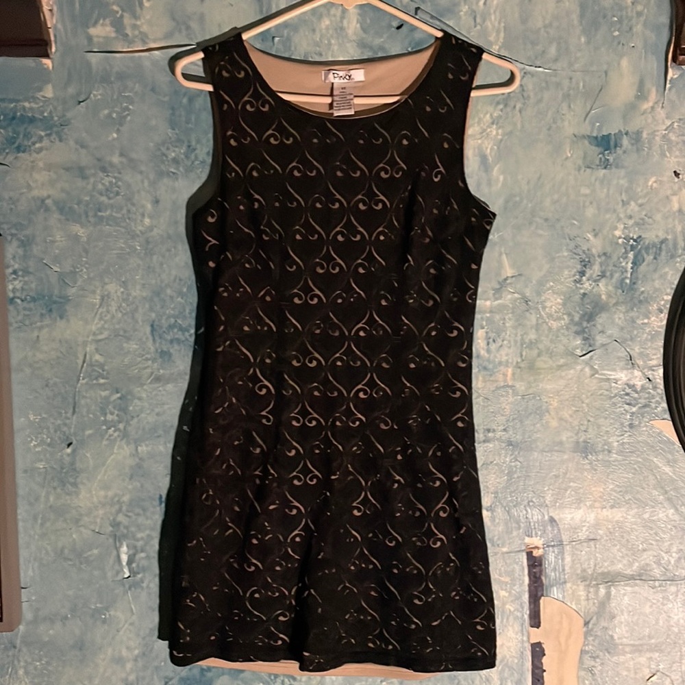 Black and cream color, 100% polyester, very soft, size xs, from Pinky, worn once